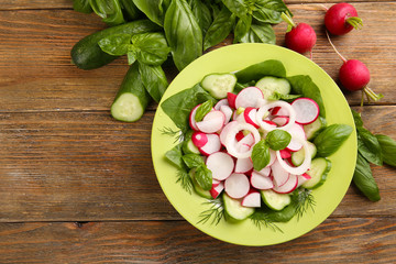 Fresh vegetable salad on table close up