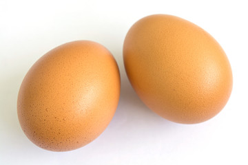 Two eggs on white background 