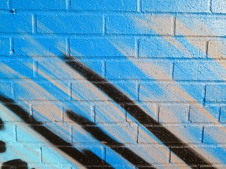 Painted Wall: Colorful Abstract Pattern in Detail of Graffiti       