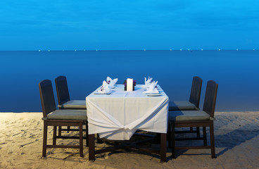 romantic dinner on the sea beach