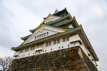 Osaka castle, Japan. Rainy overcast sky.