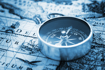Compass on vintage map