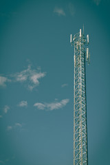 antenna repeater tower on blue sky