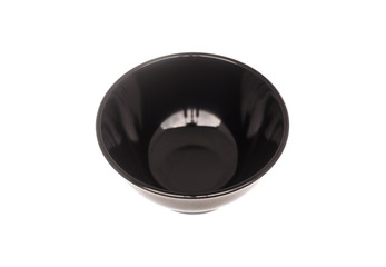 Black ceramic bowl isolated