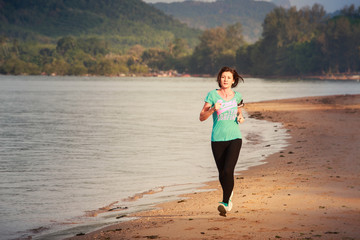 girl runs on beach at low tide