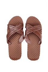 Brown rubber flip flops on a white background.
