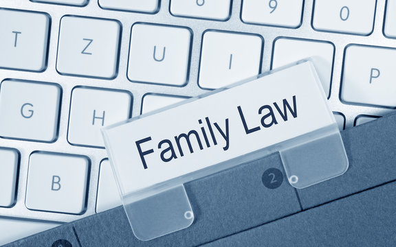 Family Law - folder on computer keyboard