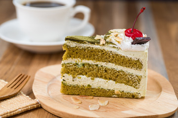 green tea cake with a coffee cup