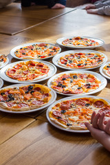 freshly prepared delicious pizza in the kitchen