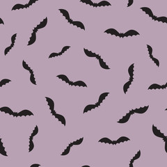 Seamless pattern with bats silhouettes for Halloween design