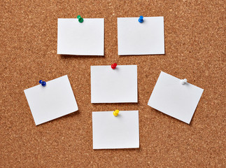 note paper on a cork board
