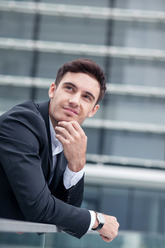 Attractive young businessman has an appointment with client