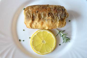 Fried hake fish on the plate