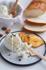 Ricotta cheese with fruit and bread