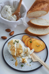 Ricotta cheese appetiser with honey and fruit