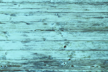 Blue wooden desks background.