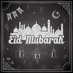 Eid Mubarak (Happy Eid) on chalkboard background