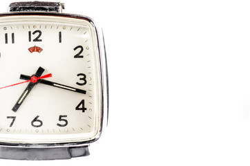 Retro alarm clock isolated on white background