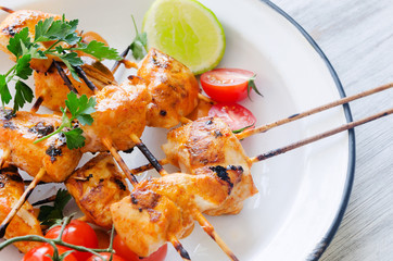 Grilled chicken kebabs with tikka masala sauce