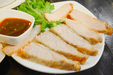 grilled pork slice served with spicy sauce