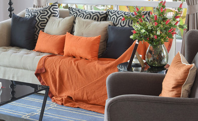 modern living room design with brown and orange tweed sofa and b