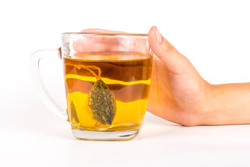 Glass mug of herbal tea