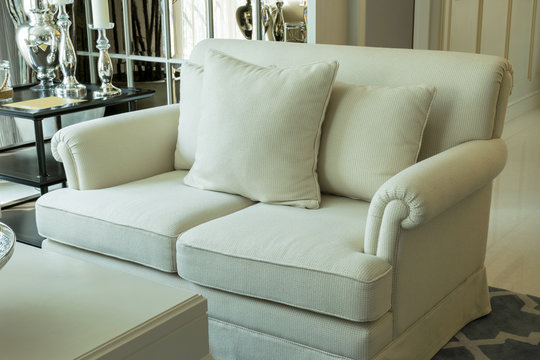 white decorative pillows on a casual sofa in the living room