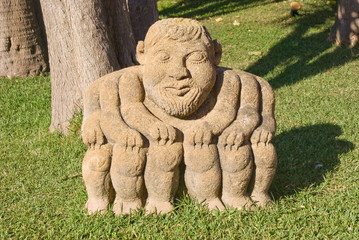 Stone monster with six legs and six arms