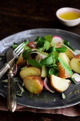 Fresh potato salad with greens
