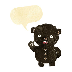 cartoon unhappy black teddy bear with speech bubble