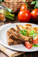 Pork spareribs served with silesian noodles and sauce