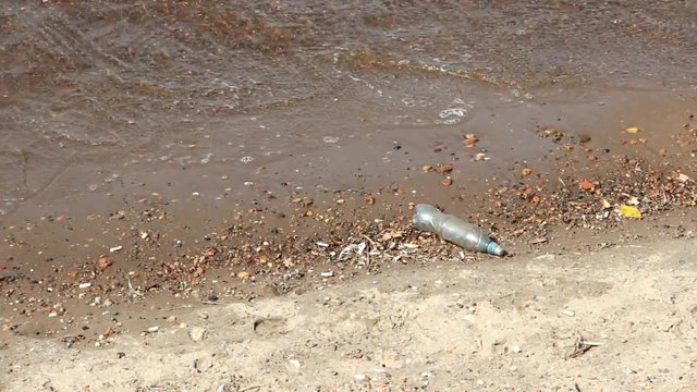 environmental issues garbage banks rivers, plastic bottle