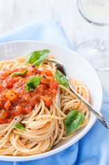 Pasta meal with glass of wine