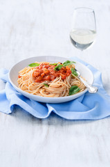 Pasta meal with glass of wine