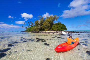 Teenage boy kayaking