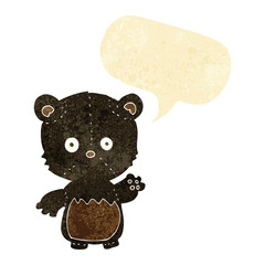 cartoon black bearcub waving with speech bubble