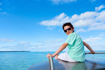 Teenage boy on a boat