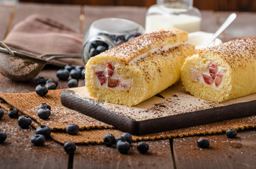 Sponge roll stuffed with strawberry cream
