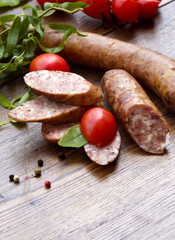 Smoked sausage with greens and tomatoes