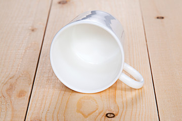 Pure white cup is on the board