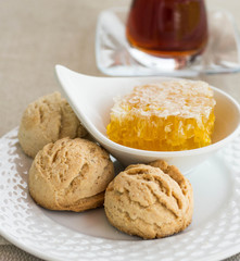 Traditional round shortbread biscuits with honey