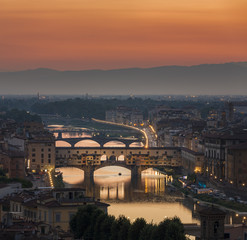 Fototapeta na wymiar Ponte Vecchio in Florence Italy during sunset