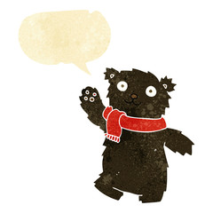 cartoon teddy bear wearing scarf with speech bubble