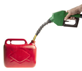 Male hand filling fuel in a red canister on white