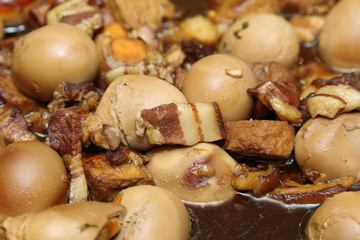 boiled egg with pork belly in chinese herb sauce