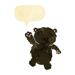 cartoon waving black bear with speech bubble
