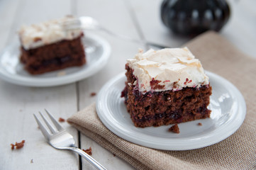 Piece of cherry and meringue cake
