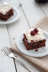 Piece of cherry and meringue cake