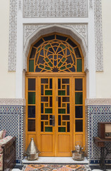 Interior of house in arabian style with wooden door