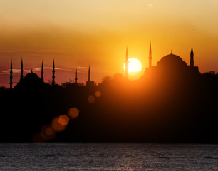 Hagia Sophia and The Blue Mosque during sunset in Istanbul Turkey